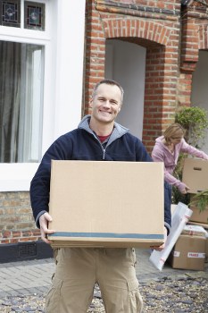 Removal van and packed boxes ready for a house move in Uxbridge