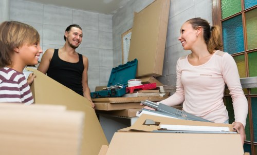 Moving team handling belongings carefully during an Uxbridge van service