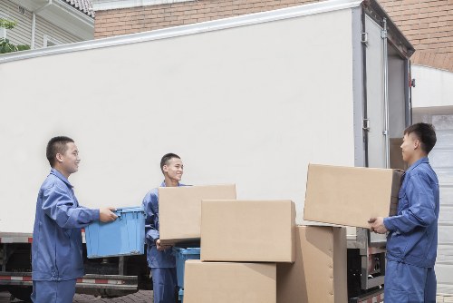 Office move coordination with labelled boxes and workstations