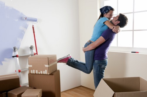 Careful loading of household items for a local removal service in Uxbridge