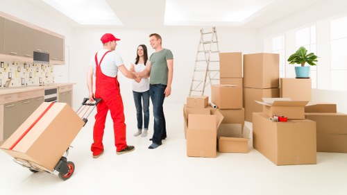 Family preparing belongings for house removals in Uxbridge
