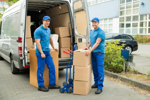Prepared boxes and furniture ready for a Uxbridge moving truck