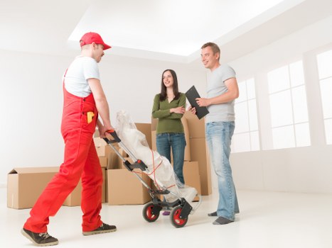 Packed office furniture and equipment prepared for relocation