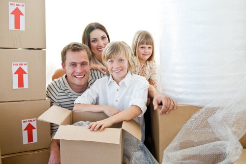 Professional team loading bulky furniture for a Uxbridge move